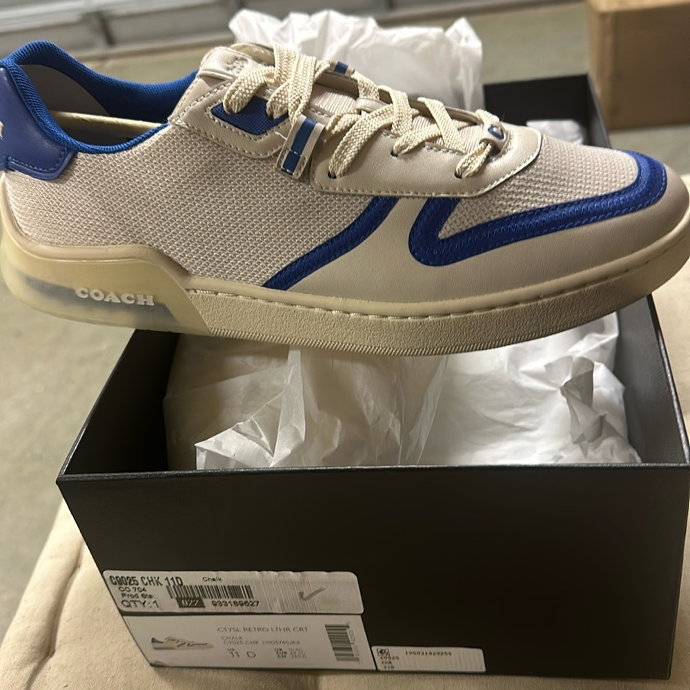 Men Brand New Coach Sneakers. Would look nice with jeans or slacks.